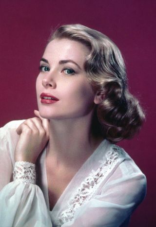 Grace Kelly in a lace-trimmed top, circa 1955