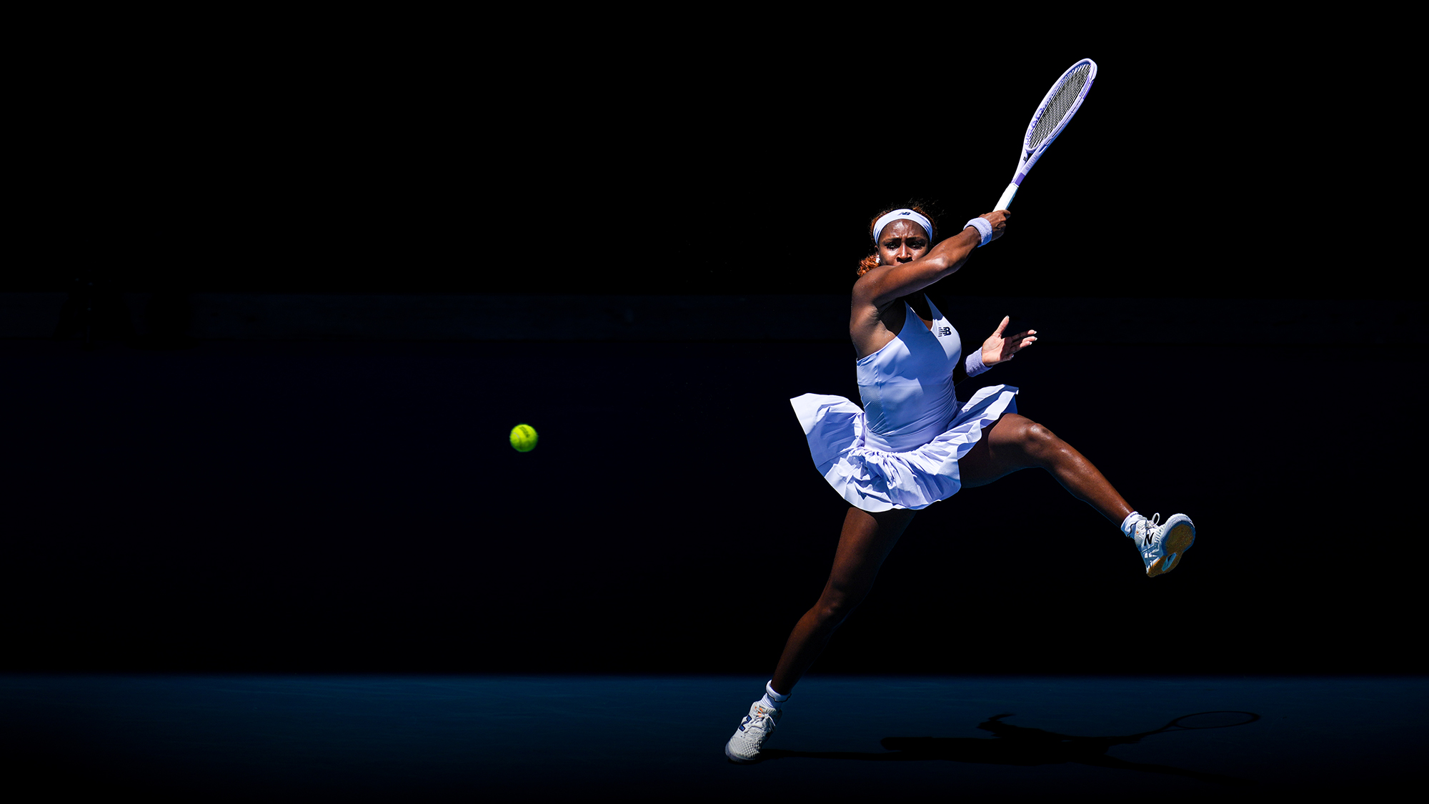 Coco Gauff of the United States plays in a Women's Singles match against Kamilla Rakhimova of Uzbekistan during the 2026 Australian Open in Melbourne, Australia