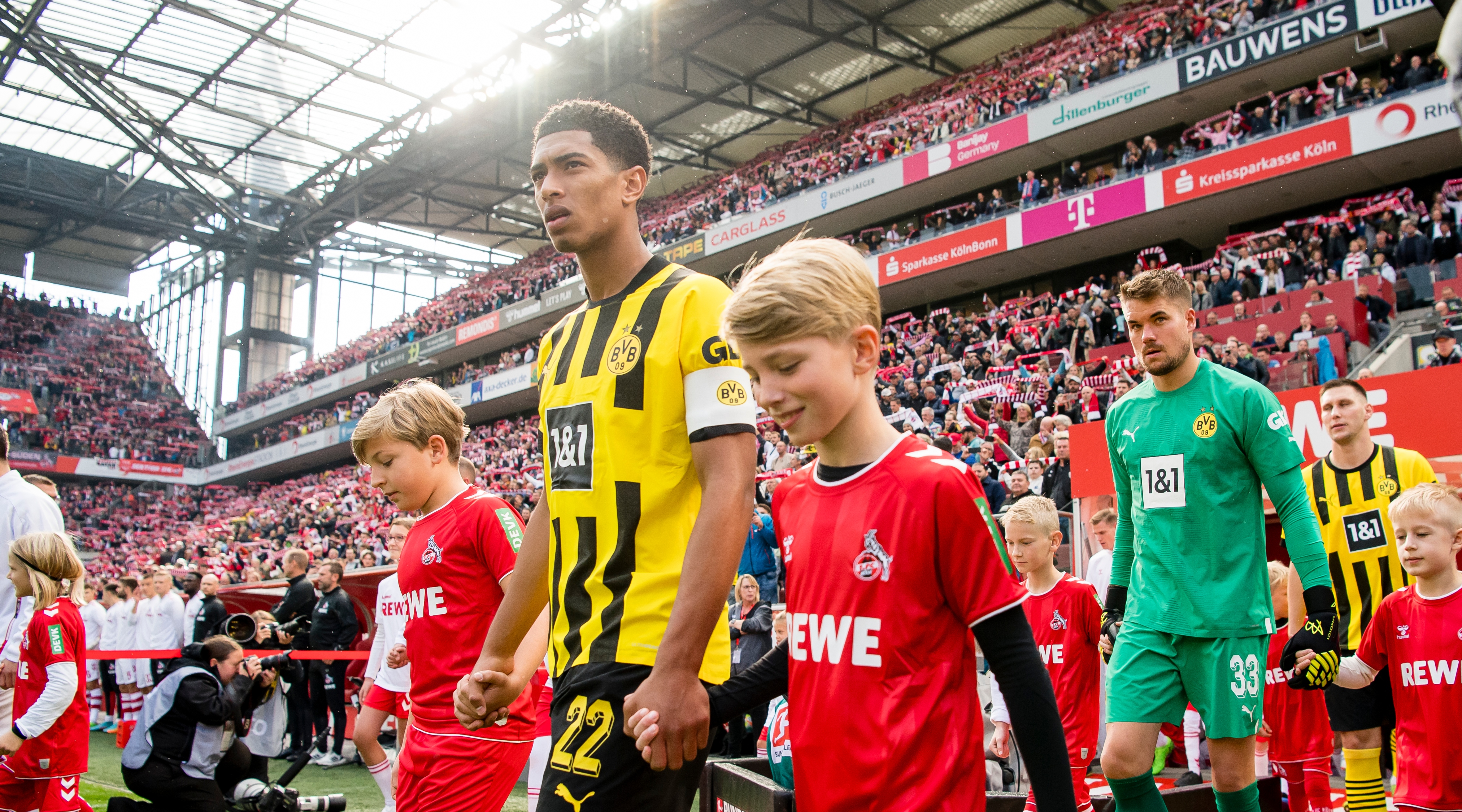 Borussia Dortmund midfielder Jude Bellingham leads his team as captain before the Bundesliga match between 1. FC Koln and Borussia Dortmund on October 1, 2022 at RheinEnergieStadion in Cologne, Germany