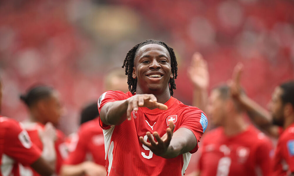 Johan Manzambi of Switzerland celebrates scoring his team's second goal during the FIFA World Cup 2026 Group B match between Switzerland and Canada.