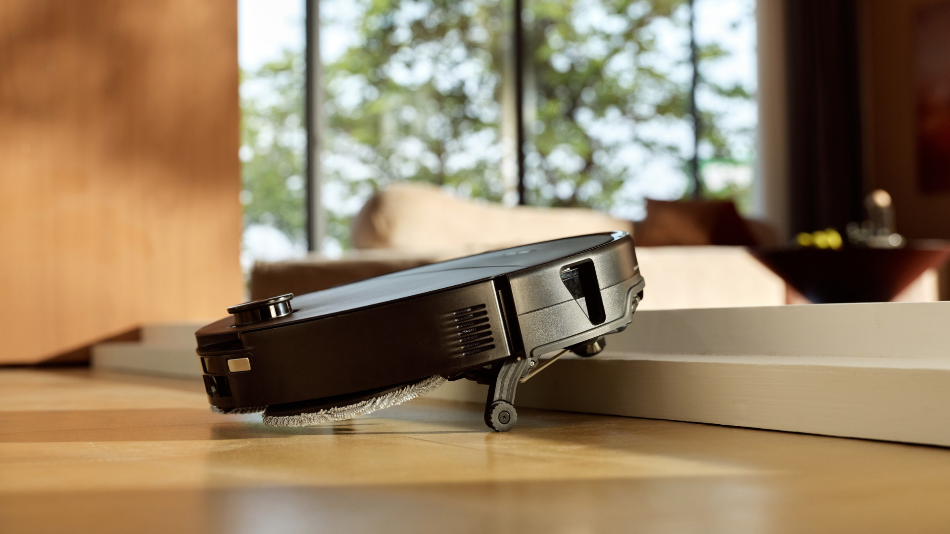 Roborock Saros 20 Neo Robot Vacuum cleaning a home around obstacles