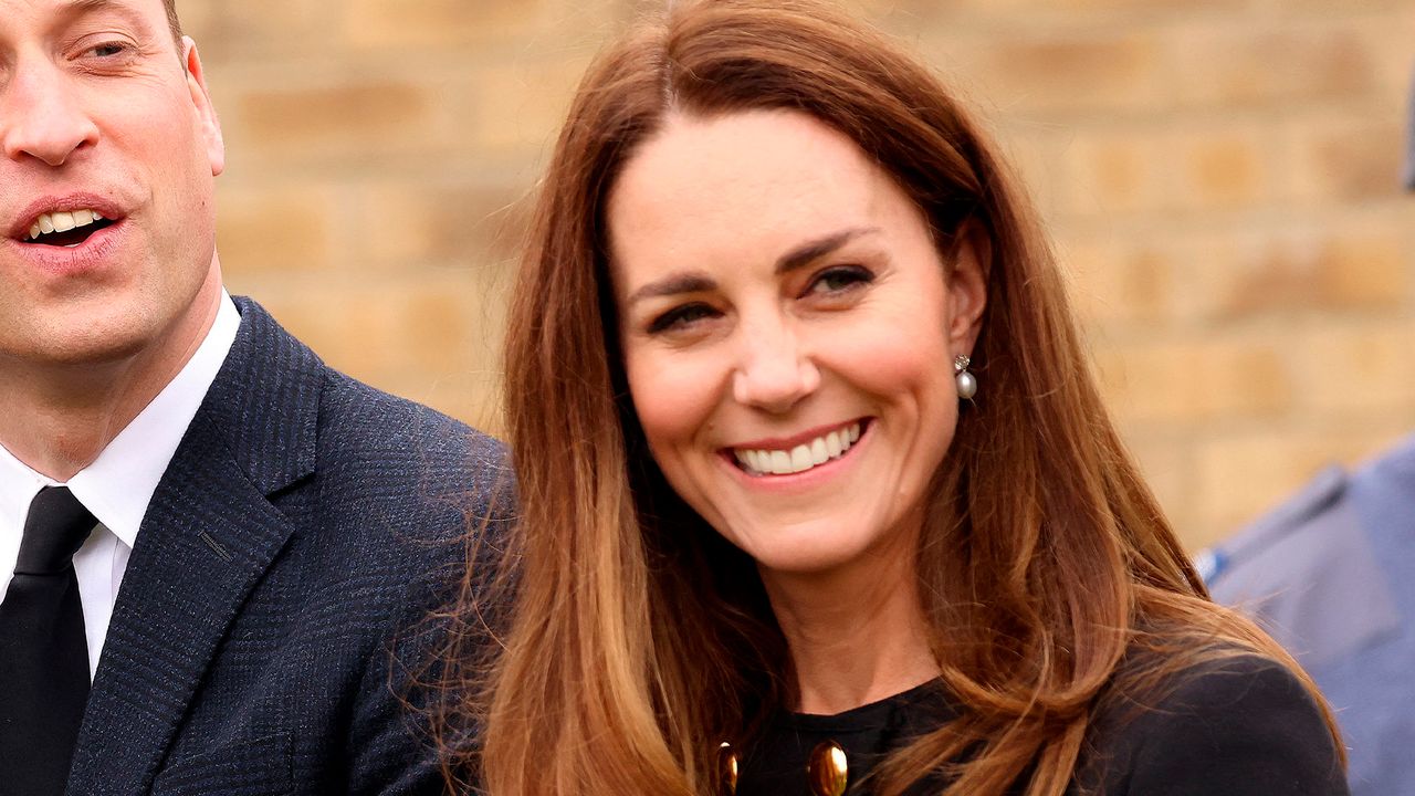 Britain&#039;s Prince William, Duke of Cambridge, and Britain&#039;s Catherine, Duchess of Cambridge, wearing black as a mark of respect following the death of Britain&#039;s Prince Philip, Duke of Edinburgh, talk with Air Cadets during their visit to 282 (East Ham) Squadron Air Training Corps in east London on April 21, 2021. - During the visit, the Squadron paid tribute to The Duke of Edinburgh, who served as Air Commodore-in-Chief of the Air Training Corps for 63 years. In 2015, The Duke passed the military patronage to The Duchess of Cambridge who became Honorary Air Commandant. (Photo by Ian Vogler / POOL / AFP) (Photo by IAN VOGLER/POOL/AFP via Getty Images)