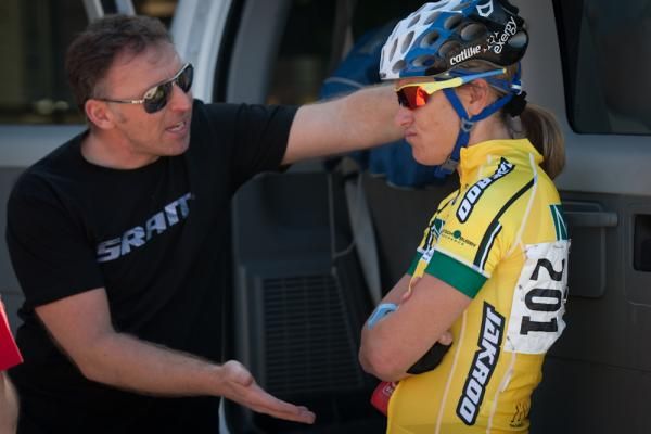 Exergy Twenty12 director Simon Cope and Kristin Armstrong discuss strategies before the criterium in the women's omnium. Cope is formerly of the British Cycling Academy.