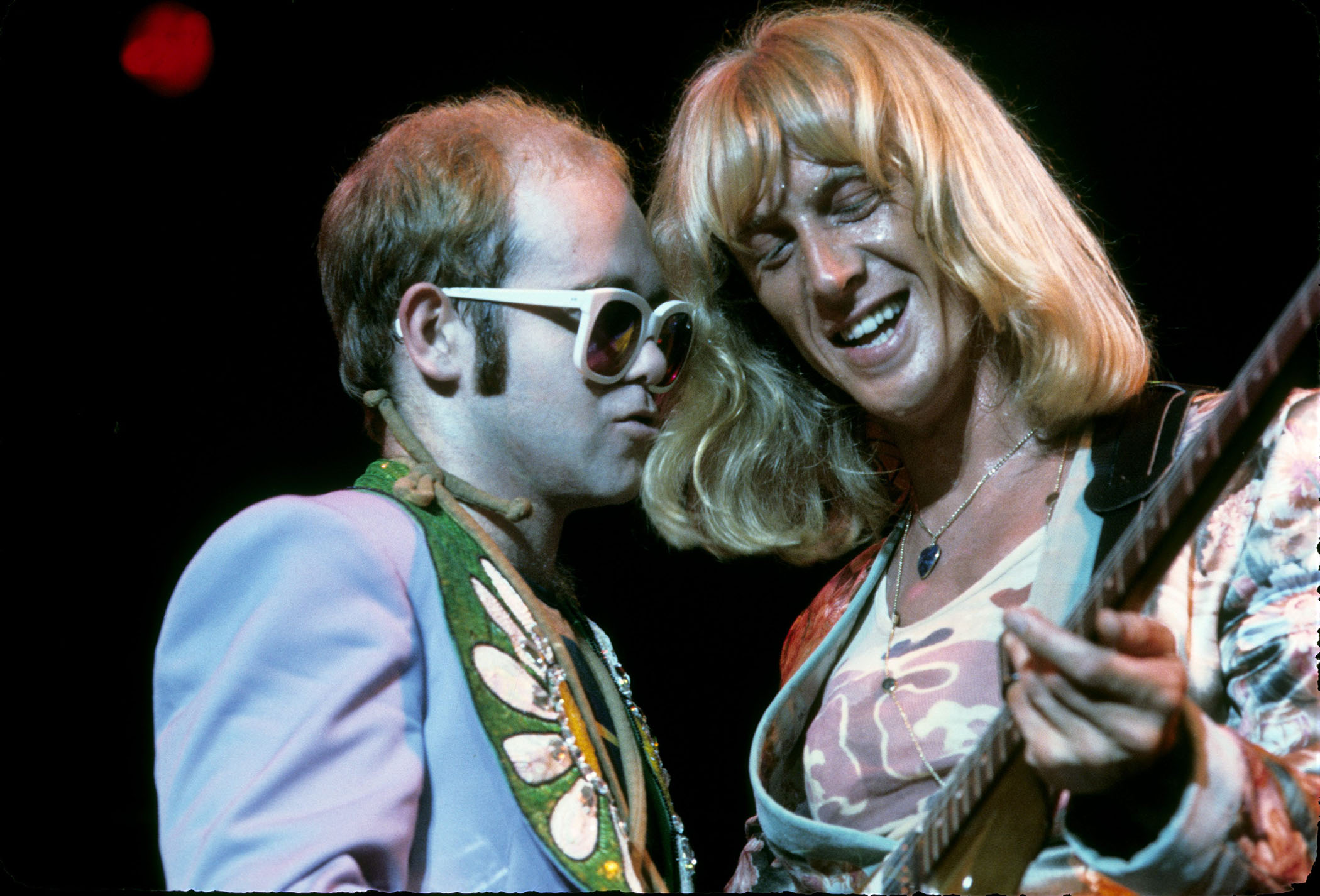 A live shot of Elton John and Davey Johnstone performing in 1976, riding high on the success of Captain Fantastic And The Brown Dirt Cowboy.