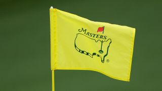 A flag with the Masters logo on it