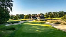 The 9th green on the Old Course and clubhouse at Les Bordes