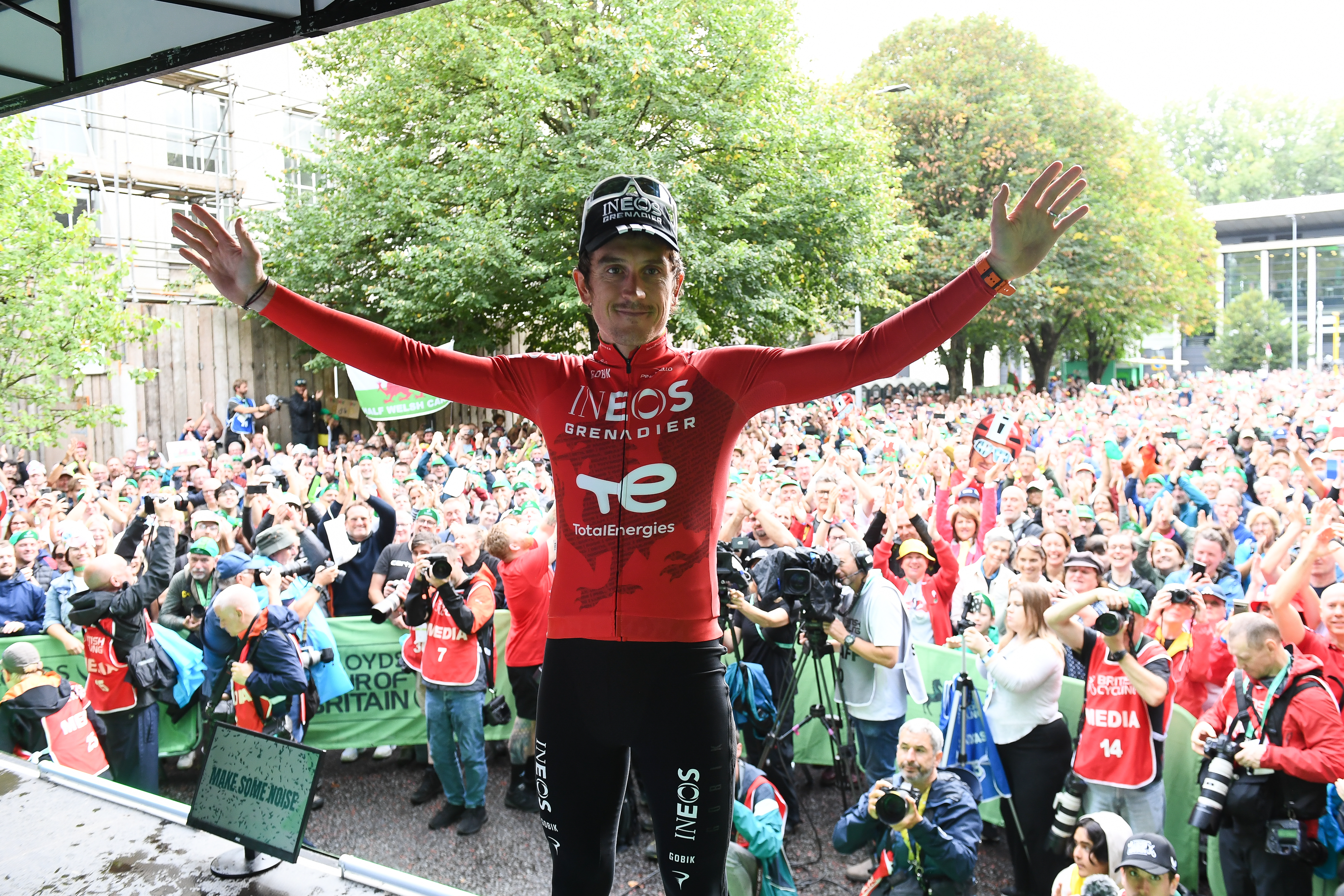 Geraint Thomas on stage after his final race