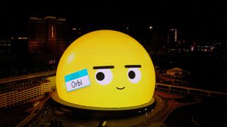 The smile face, yellow emoji named Orbi on the exterior of the Sphere.