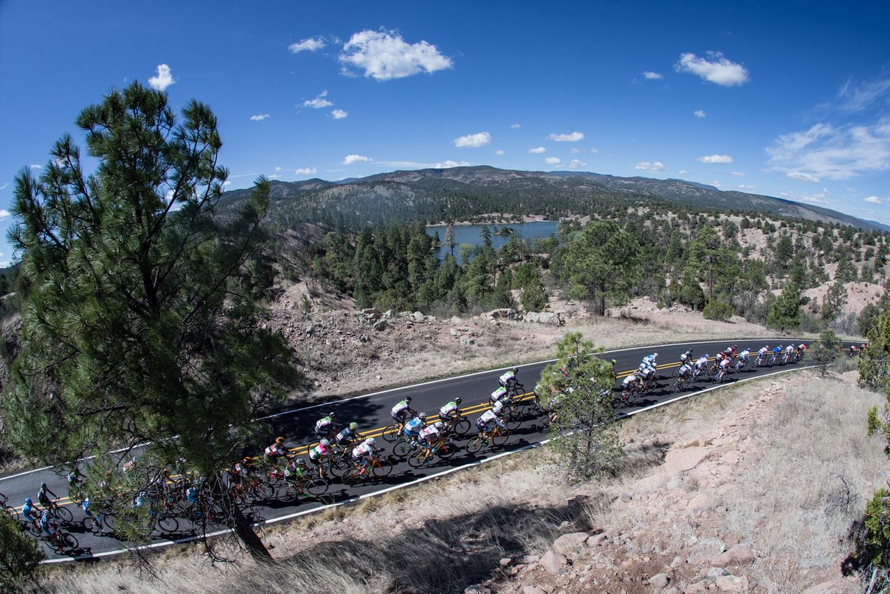 The mens field makes its way past Lake Roberts