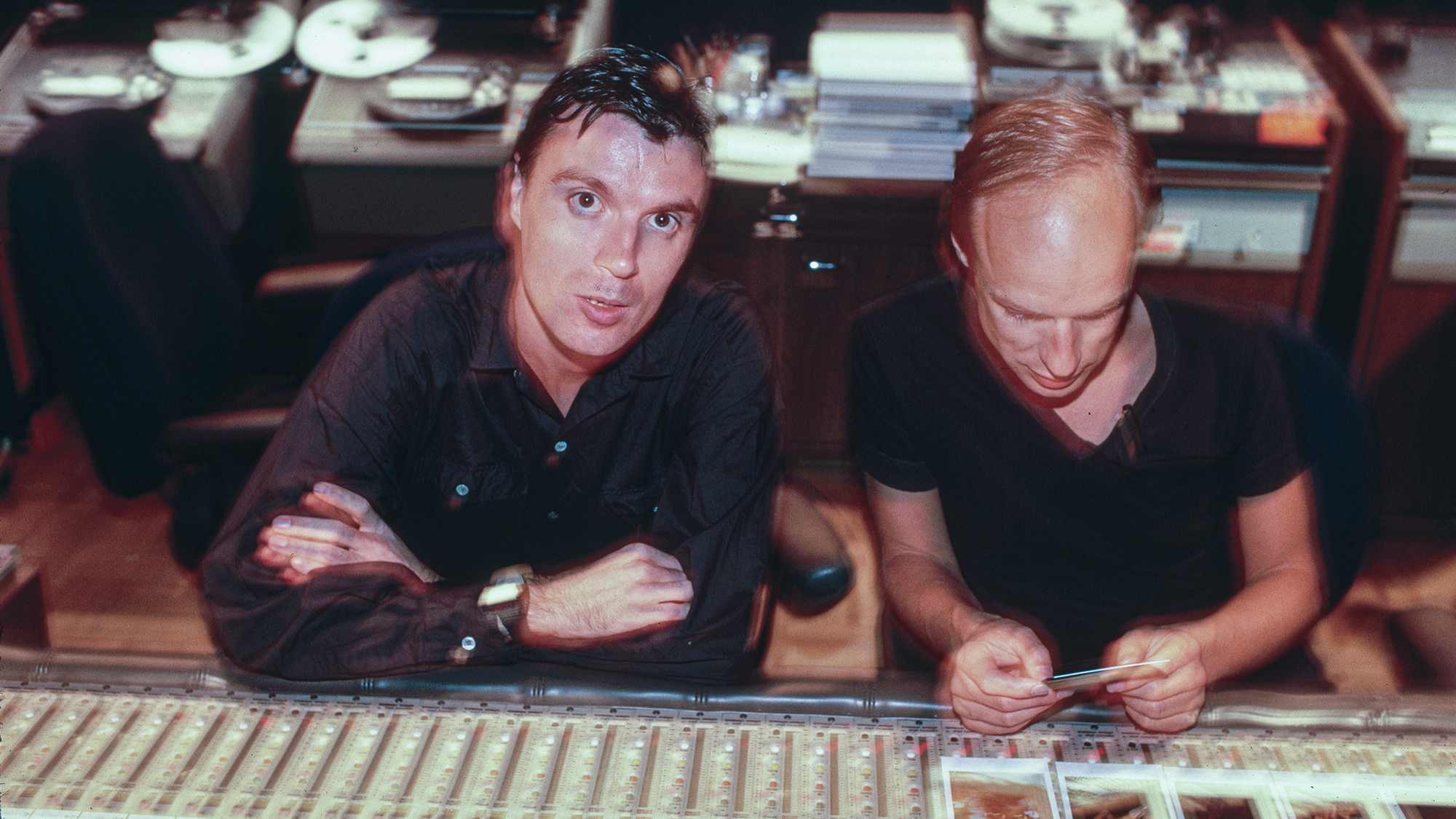 David Byrne, lead singer and guitarist for the Talking Heads, works with record producer Brian Eno in a recording studio in Mexico, 1980