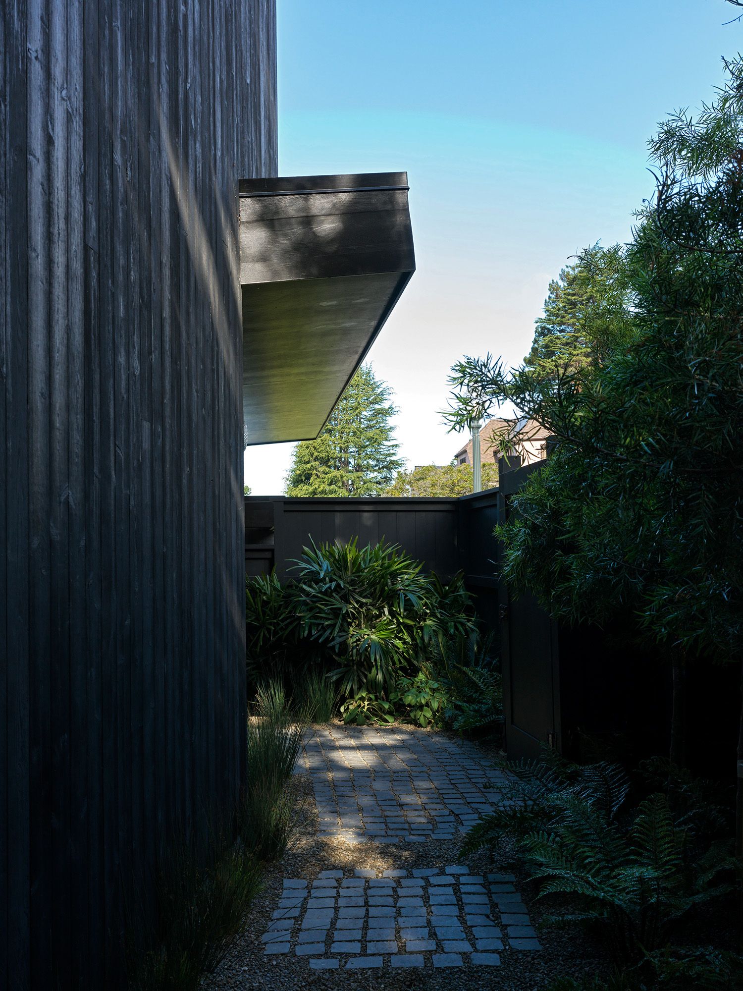 The entrance to the house retains a mid-century feel