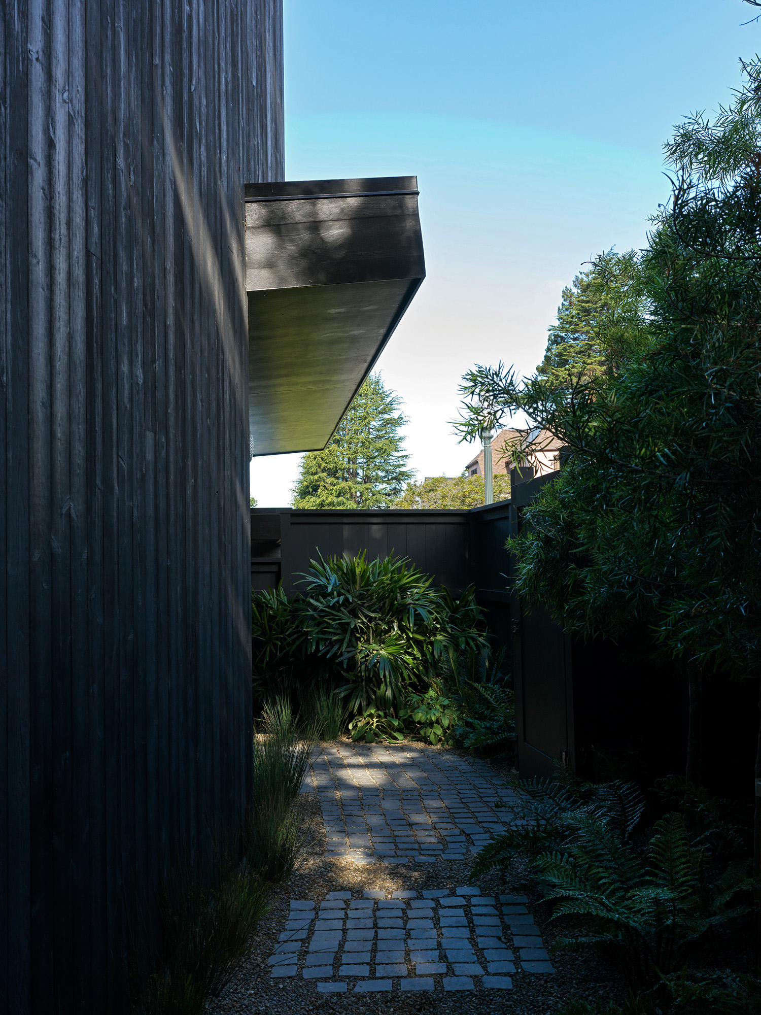 The entrance to the house retains a mid-century feel