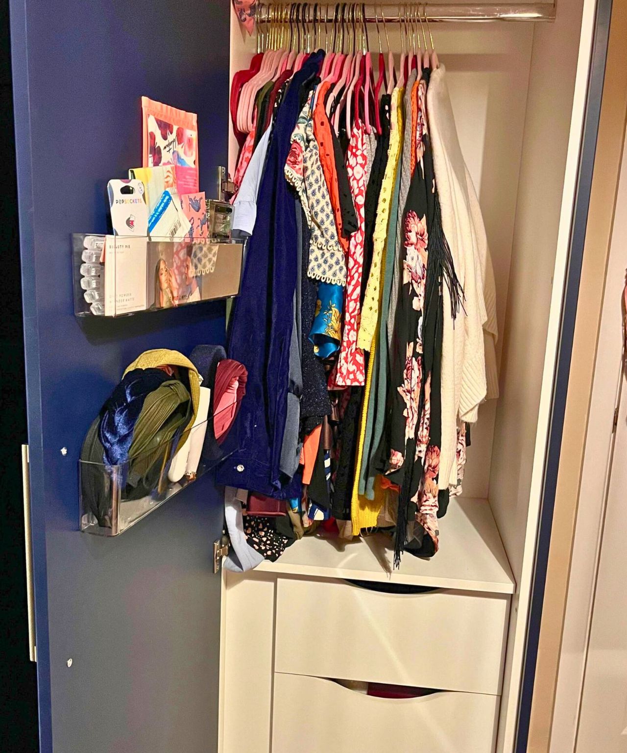 Closet after. My open closet with half a rail free