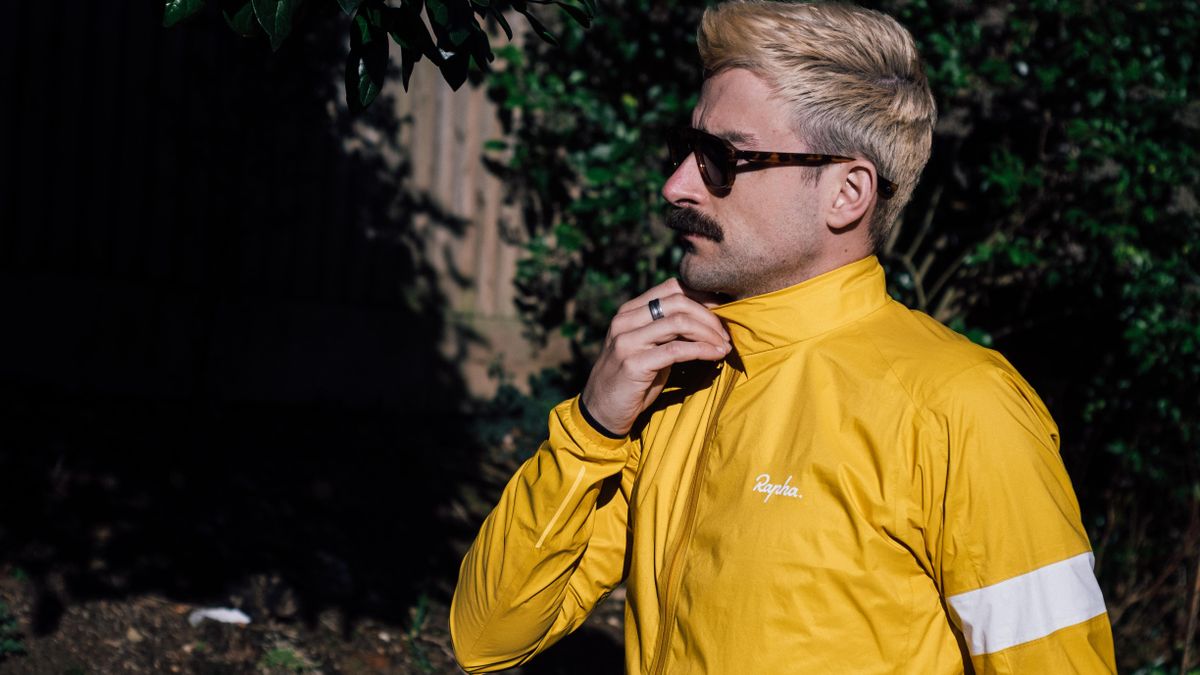 A yellow rapha core waterproof jacket