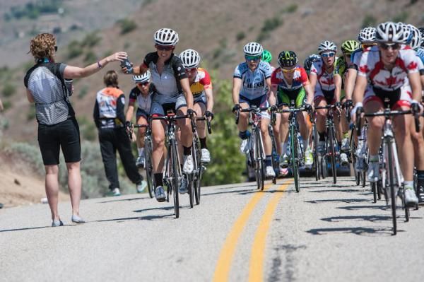 Evelyn Stevens (Specialized-Lululemon) takes a water bottle on the last time through the feed zone.