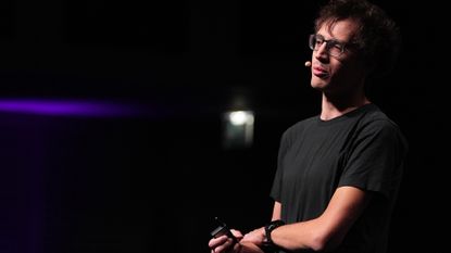 Mistral AI founder Arthur Mensch speaks at the ai-Pulse conference at Station F technology campus in Paris, France, on Friday, Nov. 17, 2023