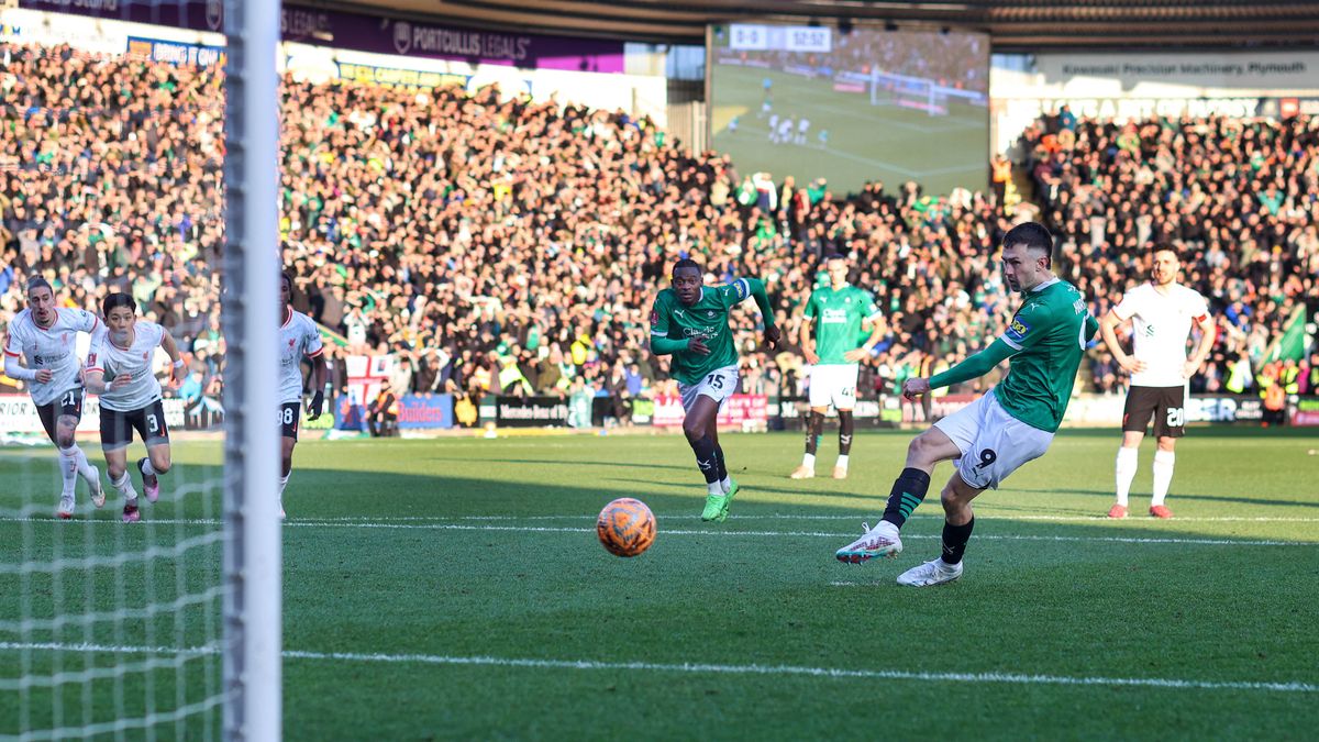 Ryan Hardie of Plymouth Argyle scores from the penalty spot during the Emirates FA Cup Fourth Round match between Plymouth Argyle and Liverpool