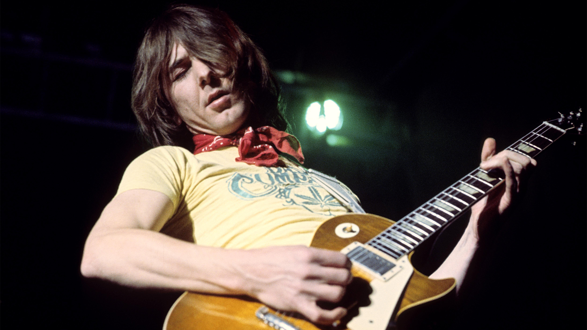 Mick Ralphs performing on stage with Bad Company in the mid 1970s