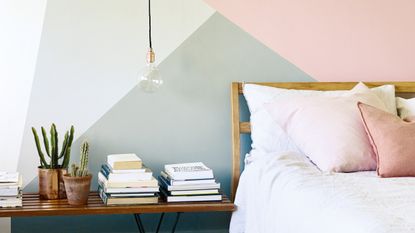 geometric colour blocking paint design in a bedroom by Fired Earth