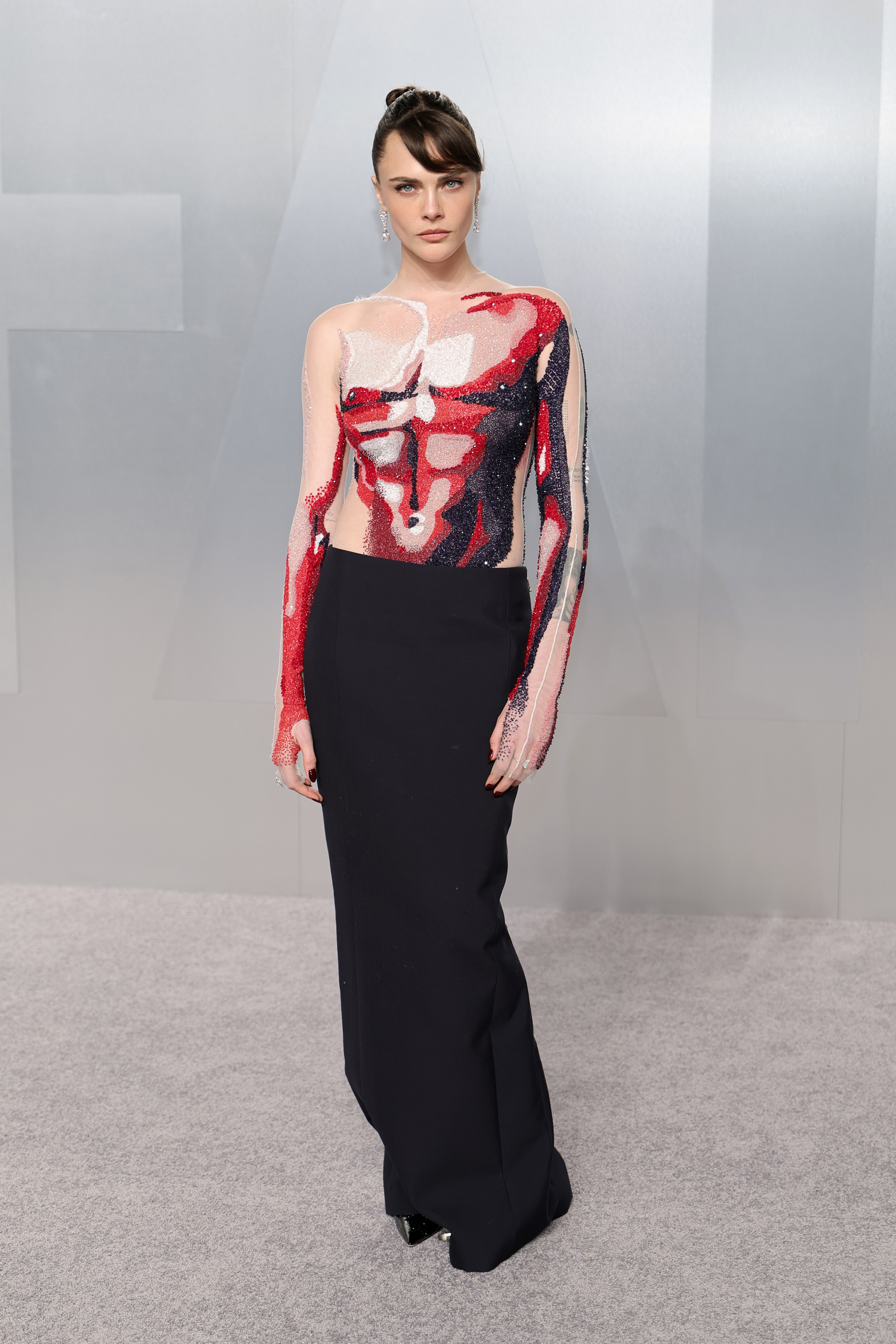 Cara Delevigne wearing a Thom Browne dress at the 2026 Vanity Fair Oscar Party