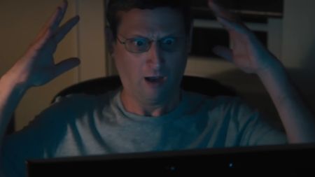 Tim Robinson as Ron Trosper, looking shocked