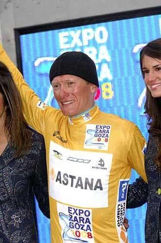 A beanied Alexandre Vinokourov (Astana Team) on the podium.