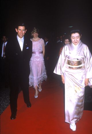 Princess Diana attends a state dinner in Kyoto with Prince Charles in 1986