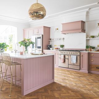 kitchen with pink cupboard