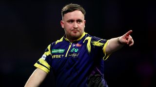 Luke Littler celebrates his victory at the World Darts Championship 2026.