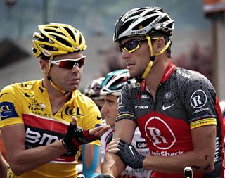 Cadel Evans (BMC) chats with 7-time Tour champion Lance Armstrong (RadioShack) on the start line.