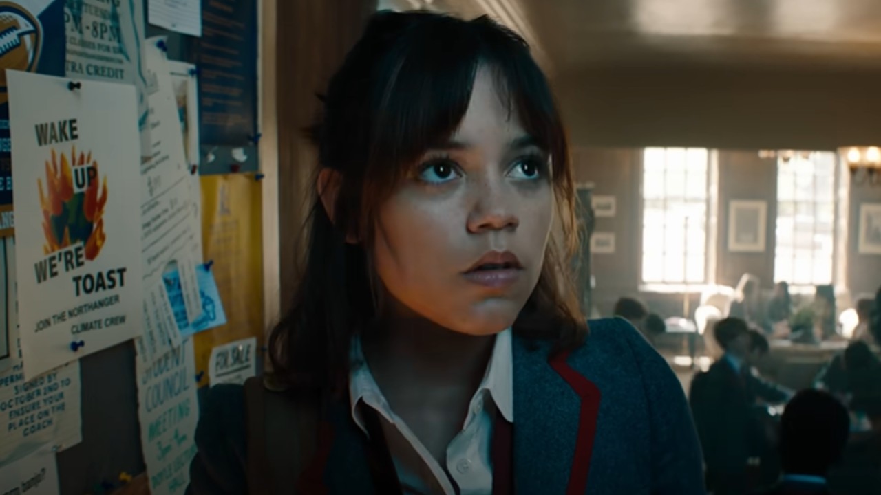 Jenna Ortega in Beetlejuice. Beetlejuice looks up, annoyed.