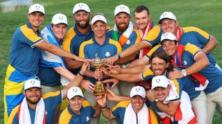 Luke Donald, Captain of Team Europe, and players of Team Europe pose with the Ryder Cup trophy following victory with a 16 and a half to 11 and a half win following during the 2023 Ryder Cup at Marco Simone Golf Club on October 01, 2023 in Rome, Italy.