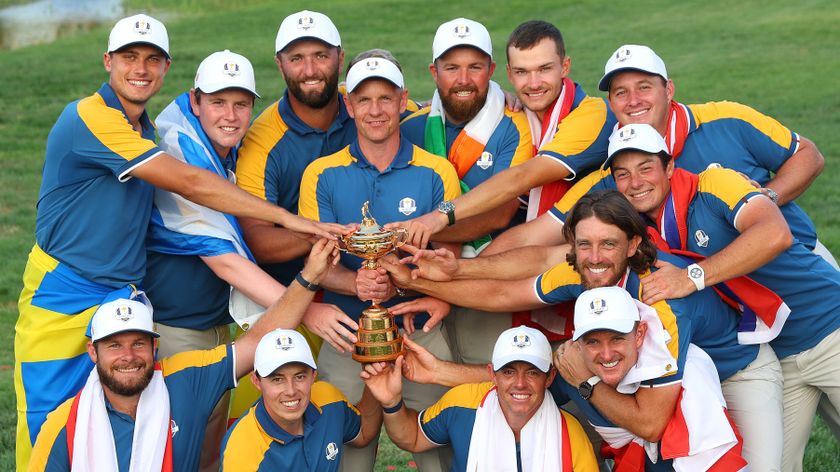Luke Donald, Captain of Team Europe, and players of Team Europe pose with the Ryder Cup trophy following victory with a 16 and a half to 11 and a half win following during the 2023 Ryder Cup at Marco Simone Golf Club on October 01, 2023 in Rome, Italy. 