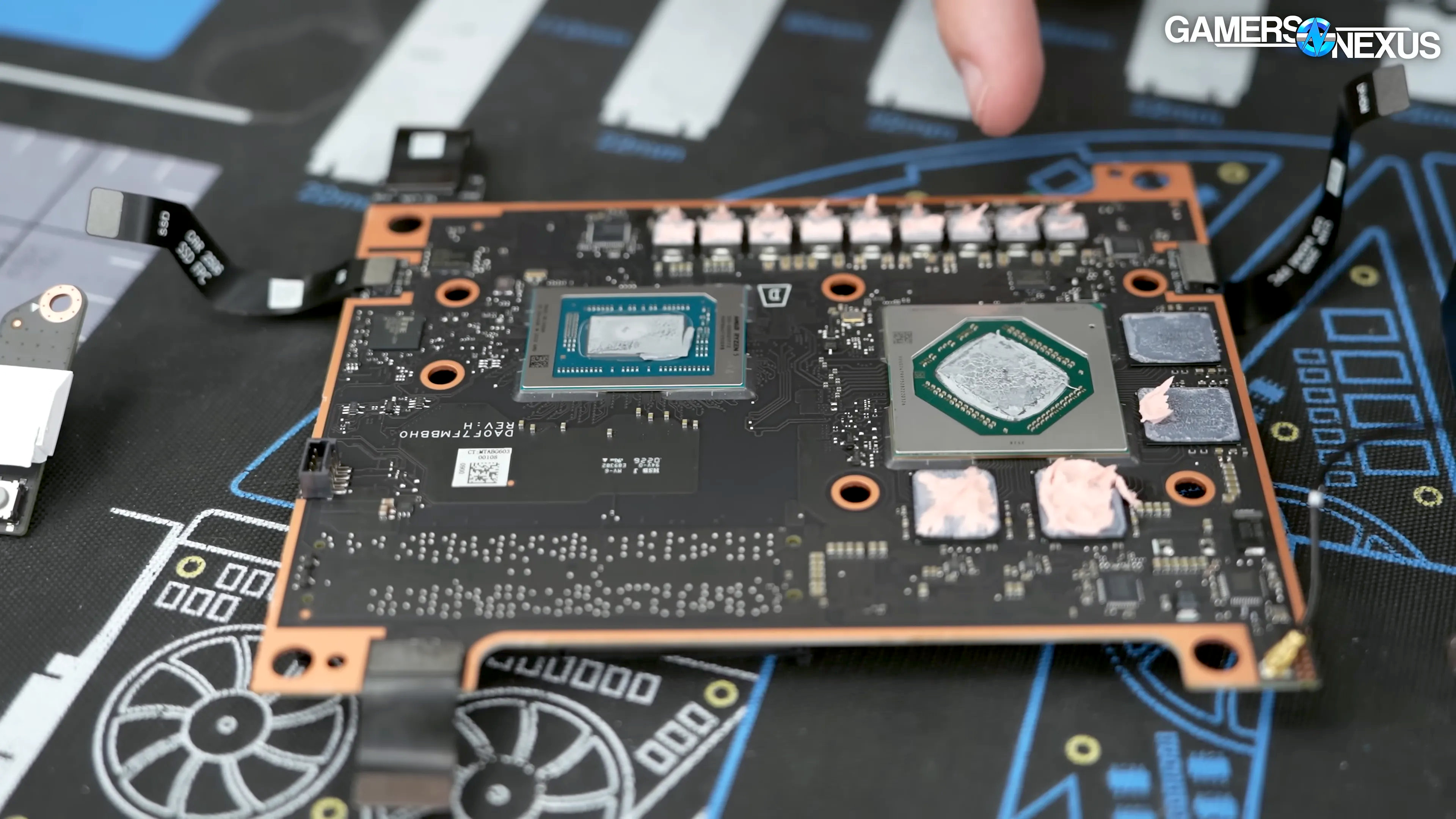 A screenshot of a Gamers Nexus YouTube video, showing the main circuit board for a Valve Steam Machine