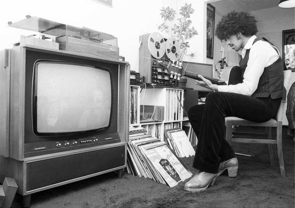 Phil Lynott at home in Embassy Court, West Hampstead, London in 1976