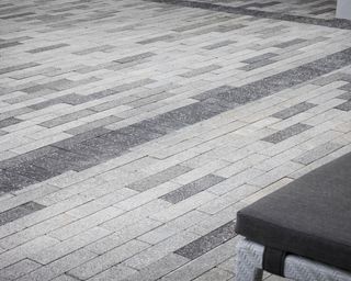 Modular patio pavers, gray pavers in a row