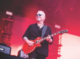 Reeves Gabrels performs onstage