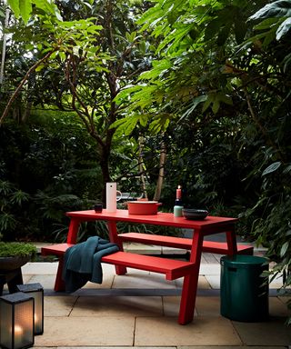 garden trend for color with red outdoor table