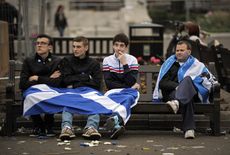 Pro-independence supporters in George Square in Glasgow after the result.