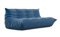 The Ligne Roset Togo sofa in blue velvet upholstery