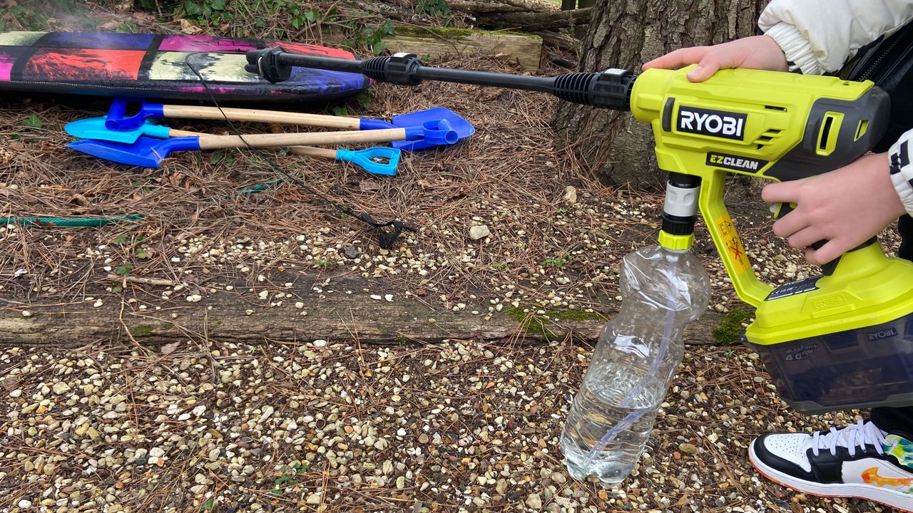 Image shows the Ryobi ONE+ 18V Cordless Power Cleaner.