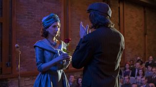 Marin Hinkle holding a rose next to Gideon Glick in The Marvelous Mrs. Maisel