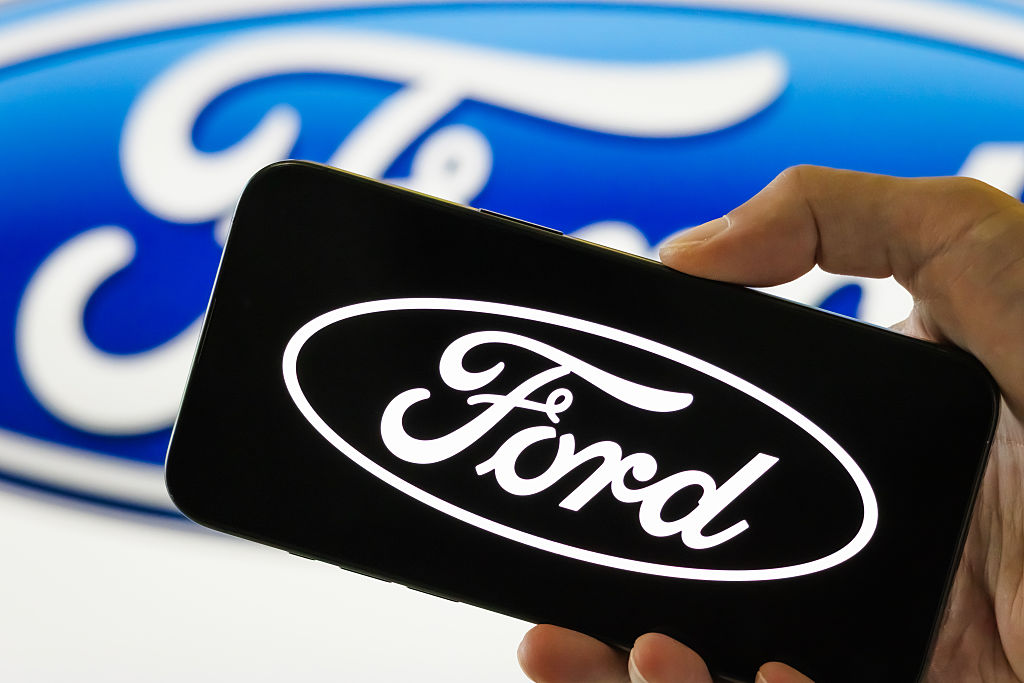The Ford logo displayed on a smartphone 
