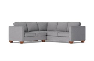 A grey L-shaped sectional sofa