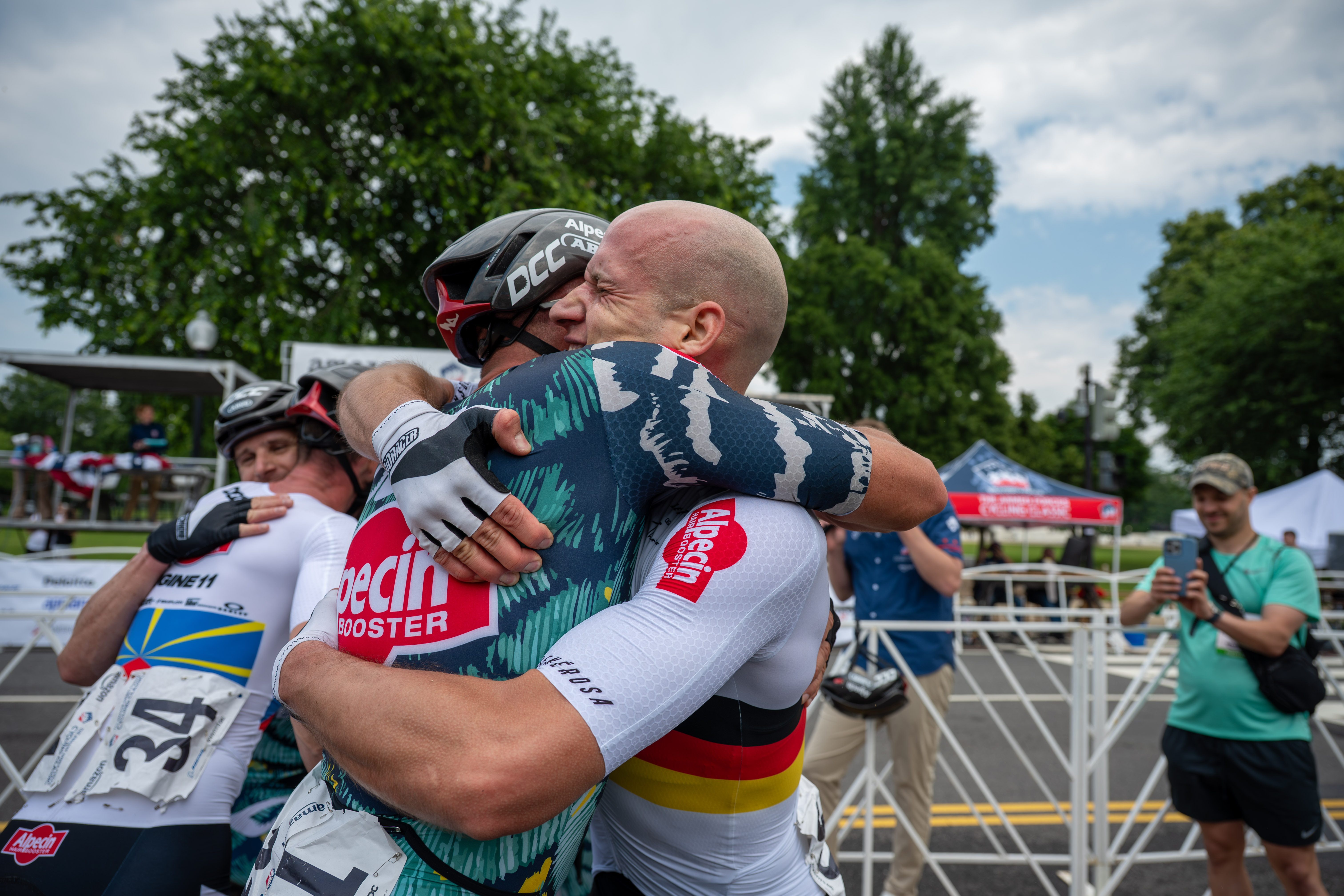 Race winner Dario Rapps celebrates with a teammate