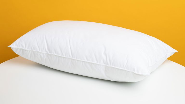 Pillow on yellow background