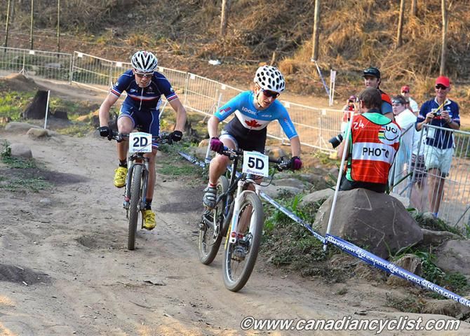 Canada'sSandra Walter about to be passed by France's Maxime Marotte