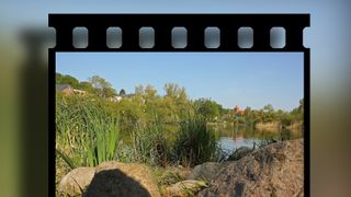 Landscape scene inside film reel