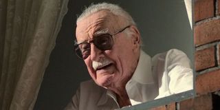 Stan Lee in a cameo out the window