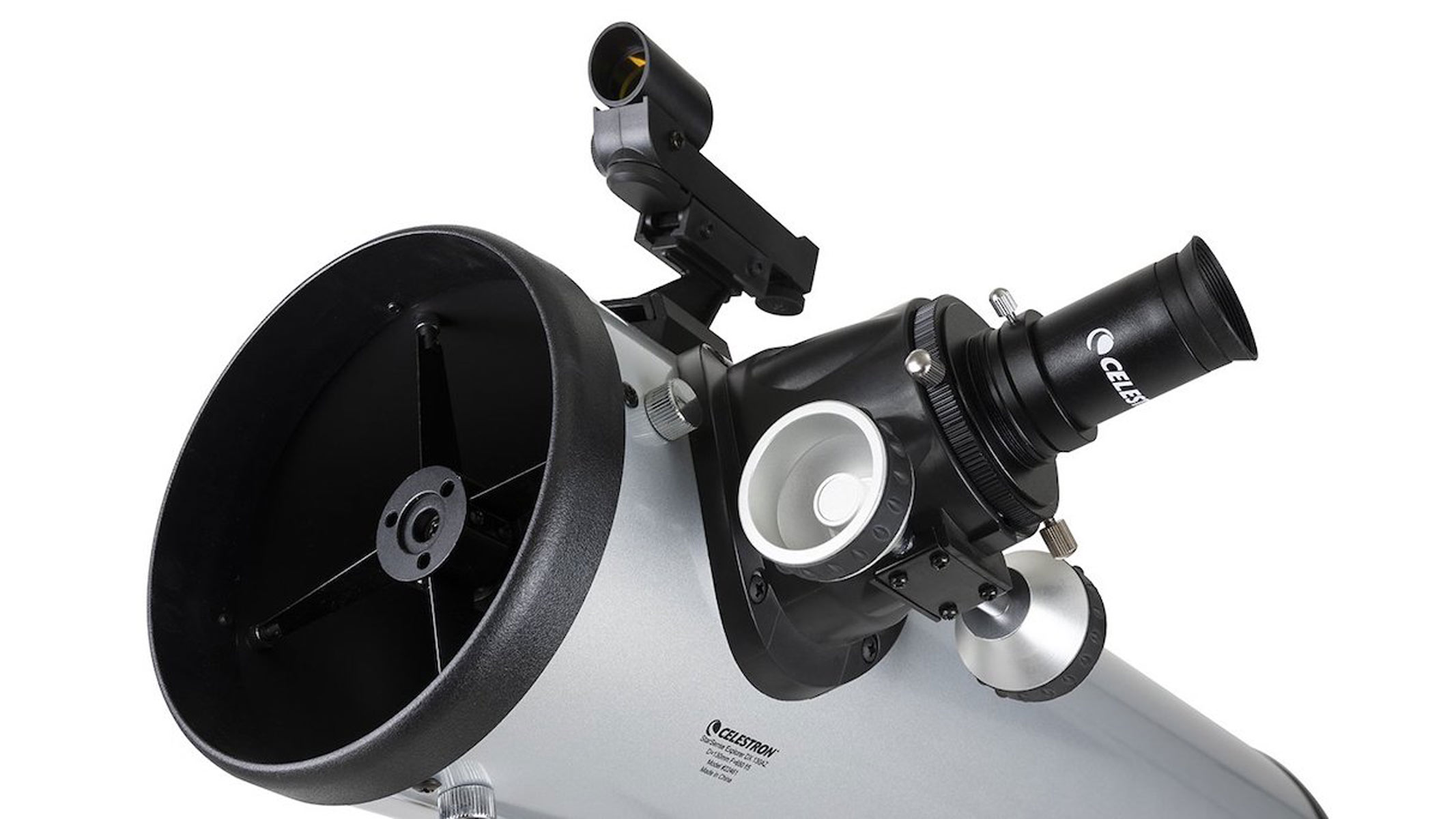 A close-up on the aperture and eyepiece on the Celestron StarSense Explorer DX 130AZ telescope against a white background.